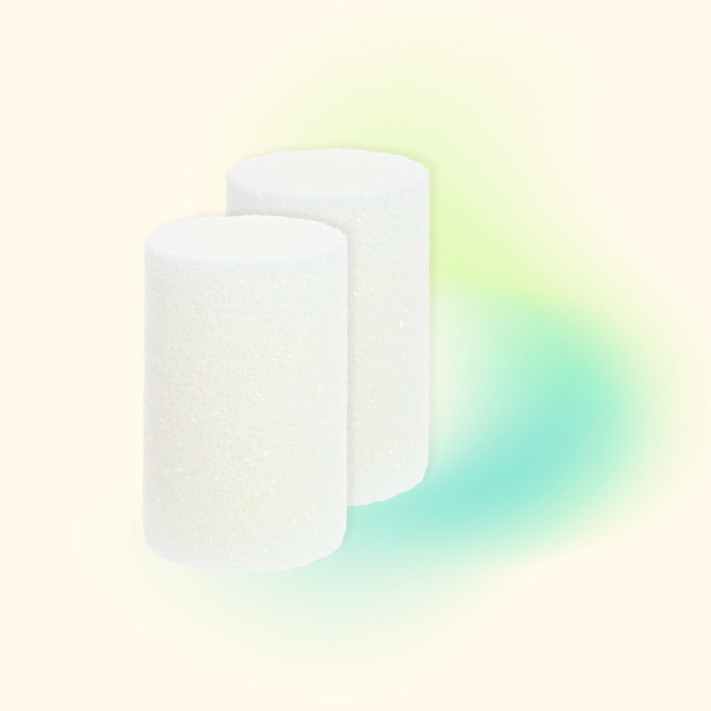 Two white styrofoam cylinders are set against a teal and cream background.