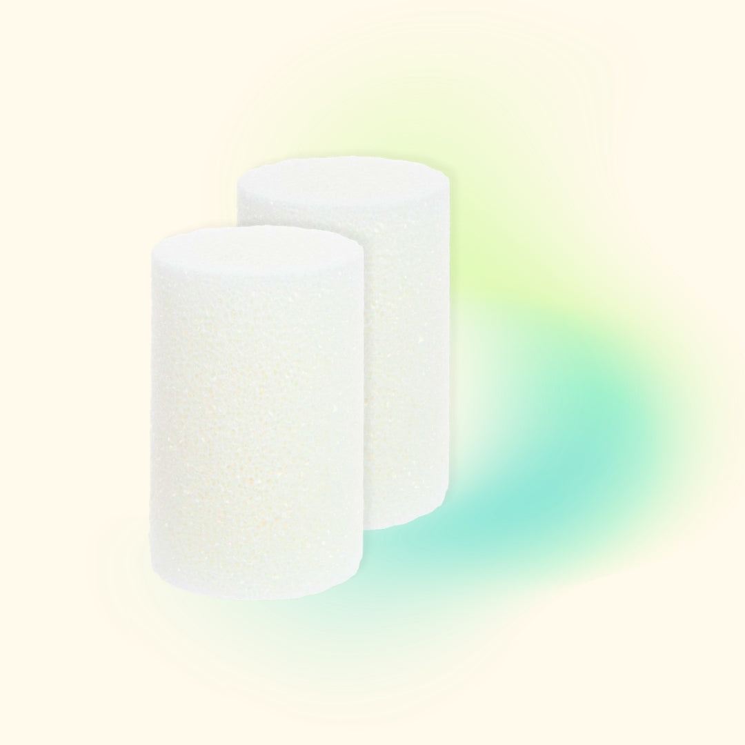 Two white styrofoam cylinders are set against a teal and cream background.